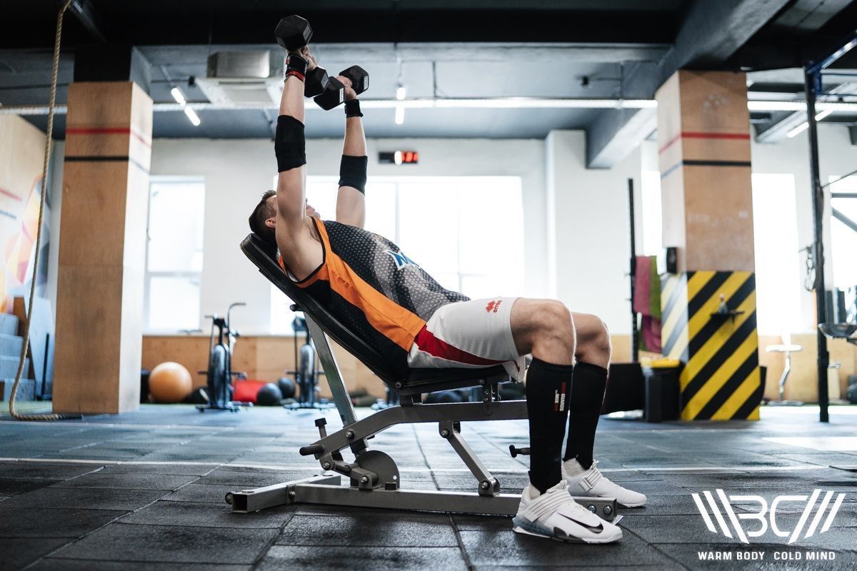 Barbell vs Dumbbell Shoulder Press The Ultimate Comparison