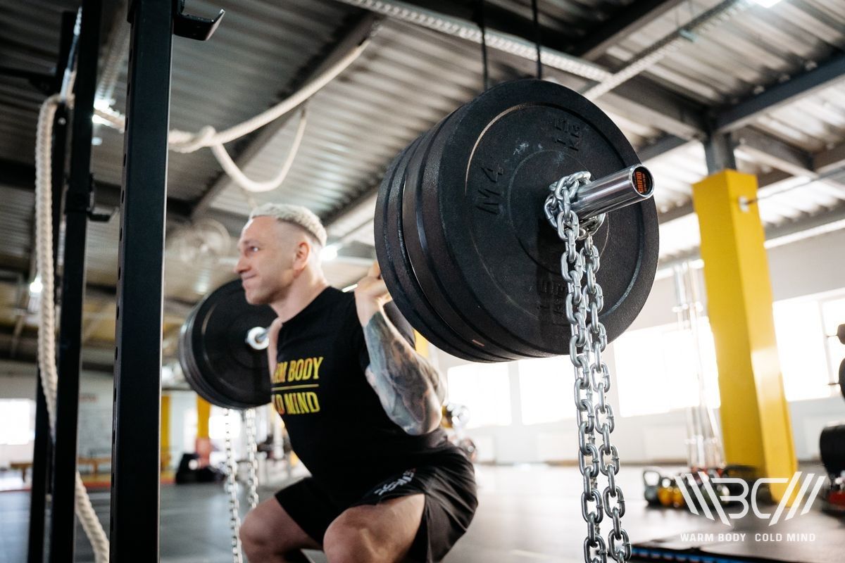 Squatting with Chains: Benefits & How To Do It